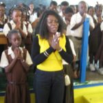 anita_prays_for_children_at_canouan_government_school